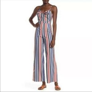 Romeo and Juliet couture striped jumpsuit orange, blue and white size medium.